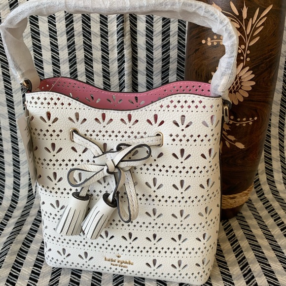 kate spade Handbags - Kate spade small white drawstring bucket crossbody
